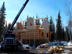 Angels Log Homes dormer gable under construction (with notch out for ridge beam)